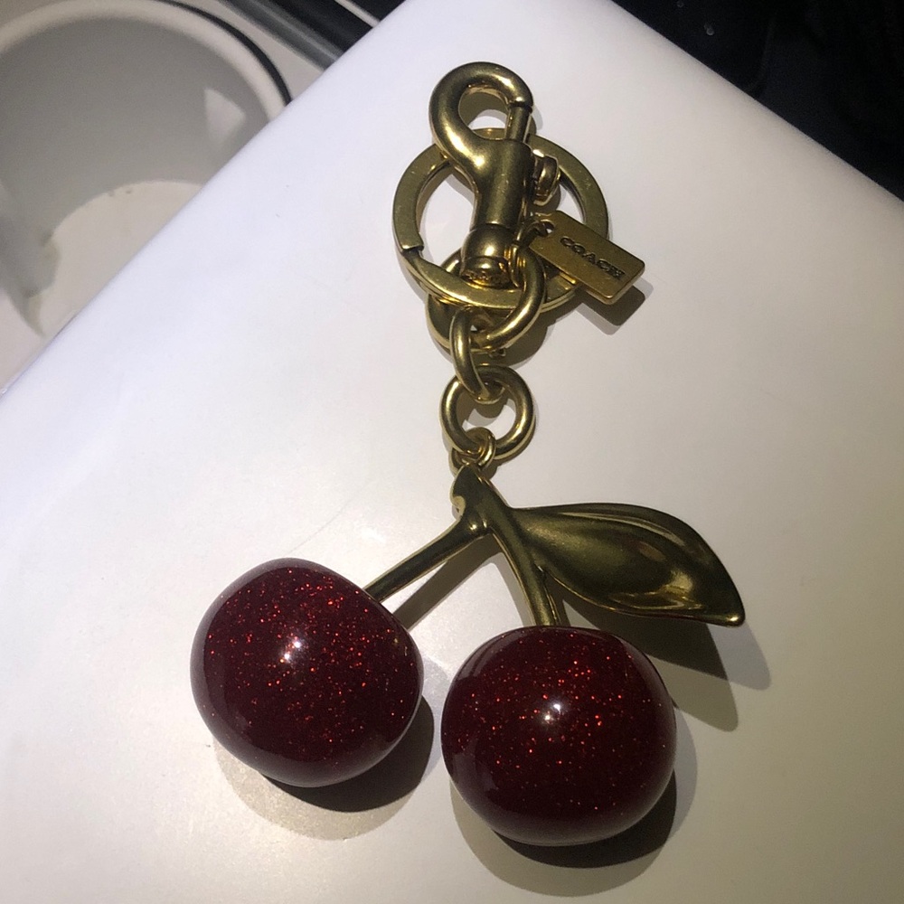 Coach Gold-Tone Keychain with Sparkling Dark Red Cherries